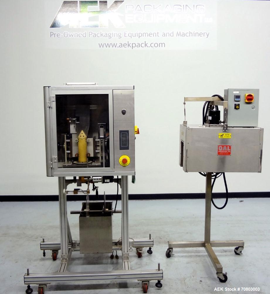 Used TriPack LSA-160 Automatic Shrink Sleeve Labeler Applicator / Neck Bander. Capable of speeds up to 100 BPM. Layflat width 40mm-170mm. Product Diameter 1" to 4.5". Cut off length 30mm-200mm. Thick...