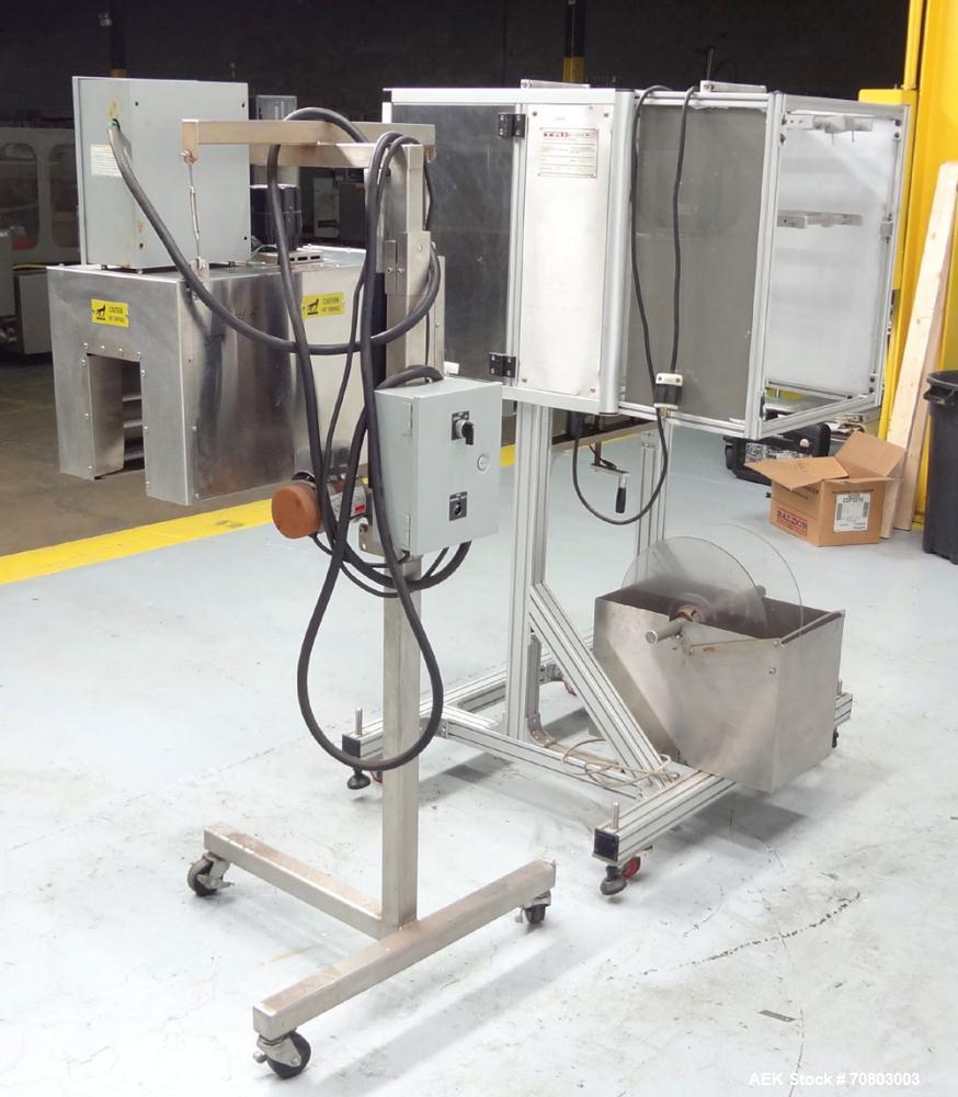 Used TriPack LSA-160 Automatic Shrink Sleeve Labeler Applicator / Neck Bander. Capable of speeds up to 100 BPM. Layflat width 40mm-170mm. Product Diameter 1" to 4.5". Cut off length 30mm-200mm. Thick...