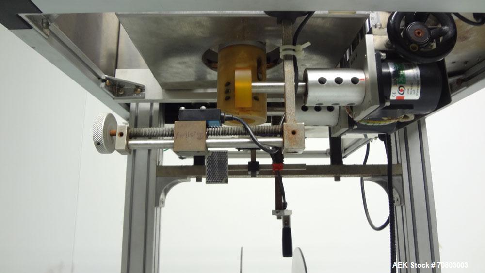 Used TriPack LSA-160 Automatic Shrink Sleeve Labeler Applicator / Neck Bander. Capable of speeds up to 100 BPM. Layflat width 40mm-170mm. Product Diameter 1" to 4.5". Cut off length 30mm-200mm. Thick...