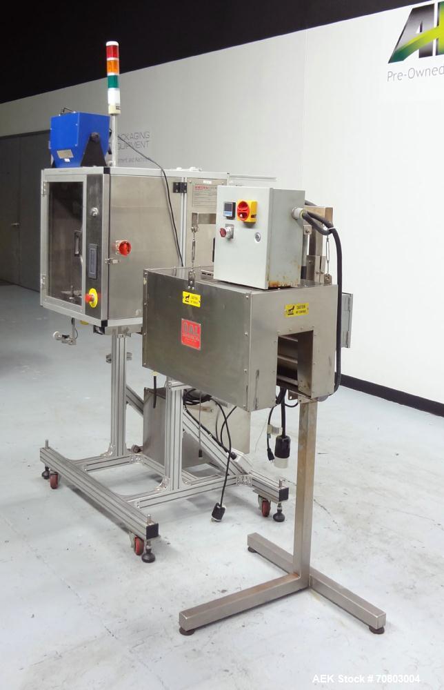 Used TriPack LSA-160 Automatic Shrink Sleeve Labeler Applicator / Neck Bander. Capable of speeds up to 100 BPM. Layflat width 40mm-170mm. Product Diameter 1" to 4.25". Cut off length 30mm-200mm. Thic...