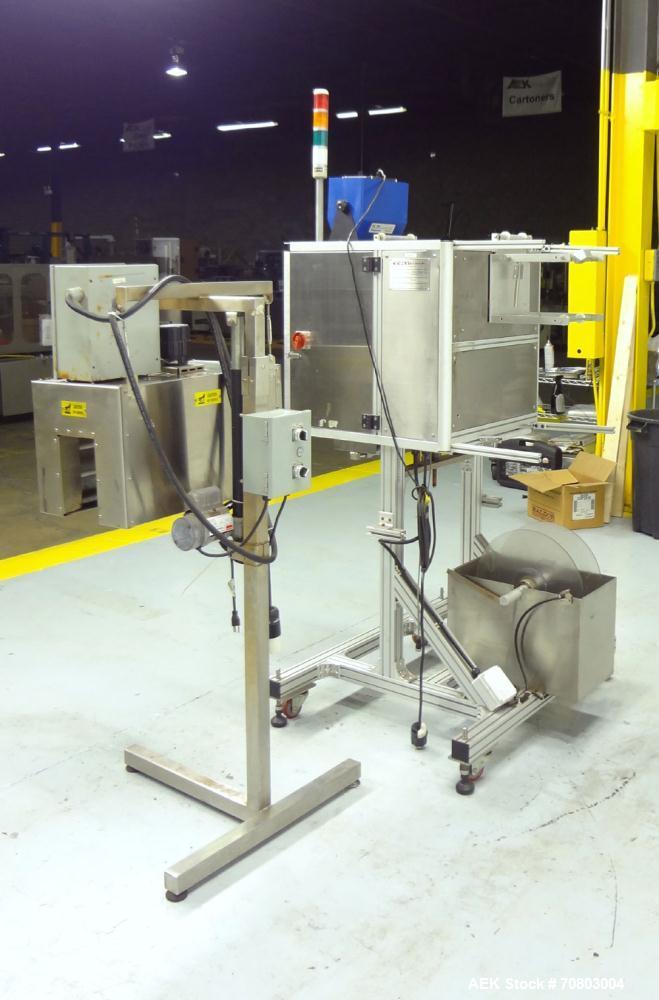 Used TriPack LSA-160 Automatic Shrink Sleeve Labeler Applicator / Neck Bander. Capable of speeds up to 100 BPM. Layflat width 40mm-170mm. Product Diameter 1" to 4.25". Cut off length 30mm-200mm. Thic...