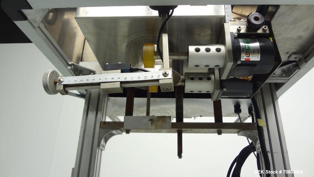 Used TriPack LSA-160 Automatic Shrink Sleeve Labeler Applicator / Neck Bander. Capable of speeds up to 100 BPM. Layflat width 40mm-170mm. Product Diameter 1" to 4.25". Cut off length 30mm-200mm. Thic...