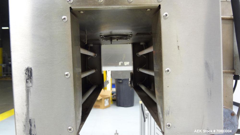 Used TriPack LSA-160 Automatic Shrink Sleeve Labeler Applicator / Neck Bander. Capable of speeds up to 100 BPM. Layflat width 40mm-170mm. Product Diameter 1" to 4.25". Cut off length 30mm-200mm. Thic...