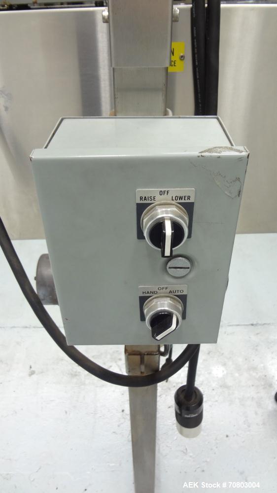 Used TriPack LSA-160 Automatic Shrink Sleeve Labeler Applicator / Neck Bander. Capable of speeds up to 100 BPM. Layflat width 40mm-170mm. Product Diameter 1" to 4.25". Cut off length 30mm-200mm. Thic...