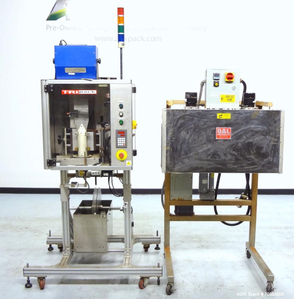 Used TriPack LSA-160 Automatic Shrink Sleeve Labeler Applicator / Neck Bander. Capable of speeds up to 100 BPM. Layflat width 40mm-170mm. Product Diameter 1" to 4.25". Cut off length 30mm-200mm. Thic...