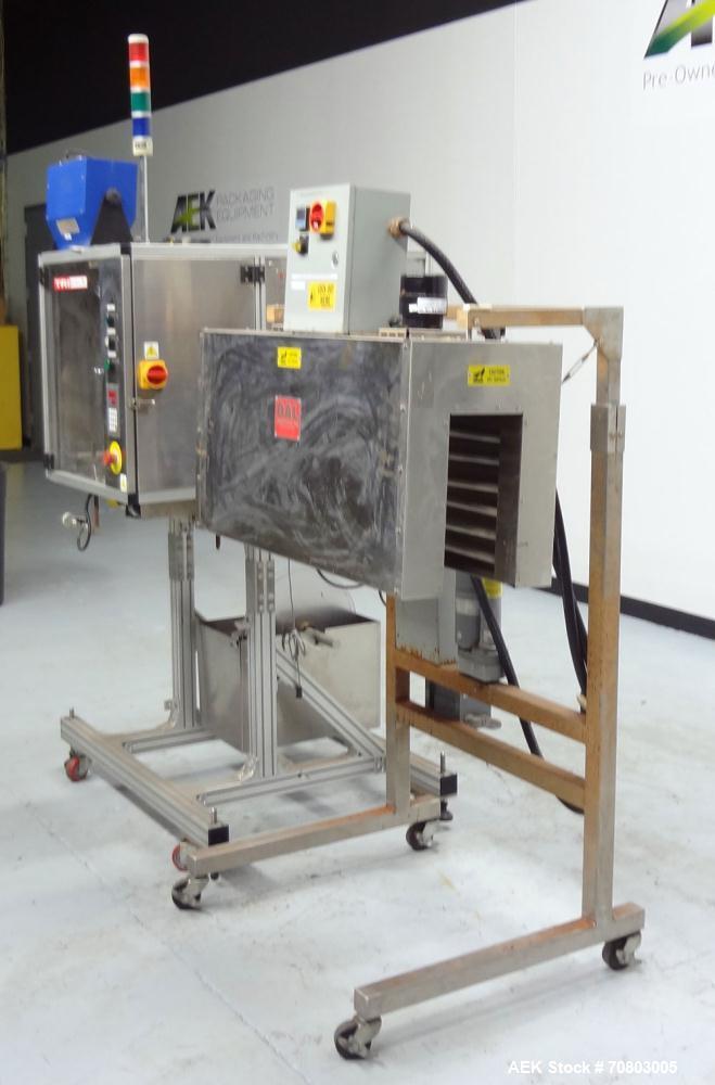 Used TriPack LSA-160 Automatic Shrink Sleeve Labeler Applicator / Neck Bander. Capable of speeds up to 100 BPM. Layflat width 40mm-170mm. Product Diameter 1" to 4.25". Cut off length 30mm-200mm. Thic...