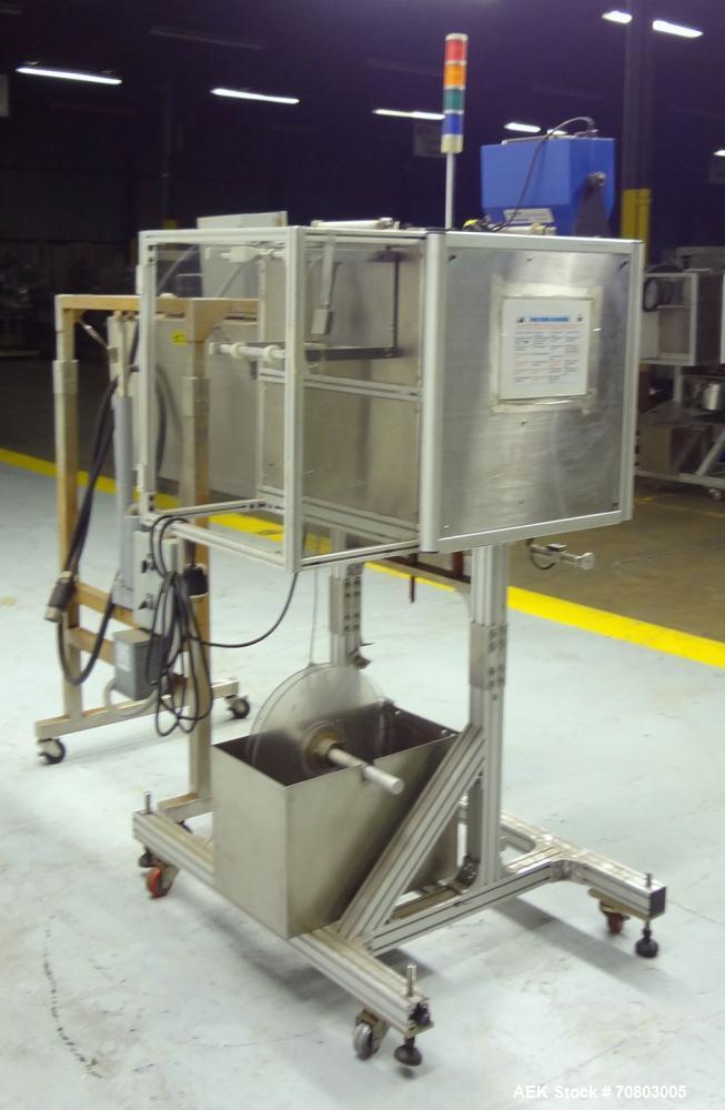 Used TriPack LSA-160 Automatic Shrink Sleeve Labeler Applicator / Neck Bander. Capable of speeds up to 100 BPM. Layflat width 40mm-170mm. Product Diameter 1" to 4.25". Cut off length 30mm-200mm. Thic...