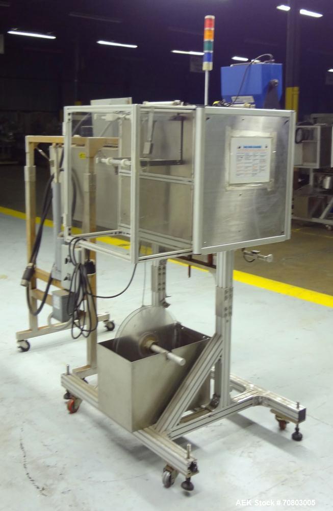 Used- TriPack LSA-160 Automatic Shrink Sleeve Labeler Applicator / Neck Bander. Capable of speeds up to 100 BPM. Layflat wid...