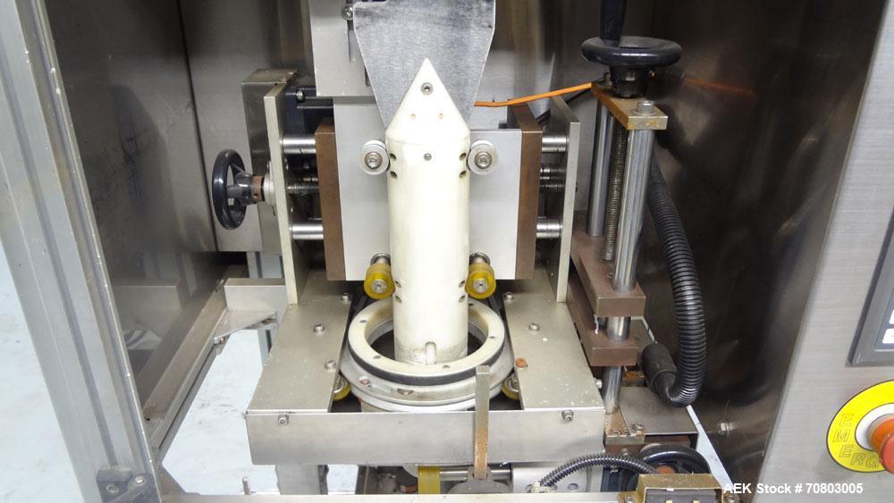 Used TriPack LSA-160 Automatic Shrink Sleeve Labeler Applicator / Neck Bander. Capable of speeds up to 100 BPM. Layflat width 40mm-170mm. Product Diameter 1" to 4.25". Cut off length 30mm-200mm. Thic...