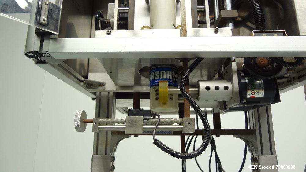 Used TriPack LSA-160 Automatic Shrink Sleeve Labeler Applicator / Neck Bander. Capable of speeds up to 100 BPM. Layflat width 40mm-170mm. Product Diameter 1" to 4.25". Cut off length 30mm-200mm. Thic...