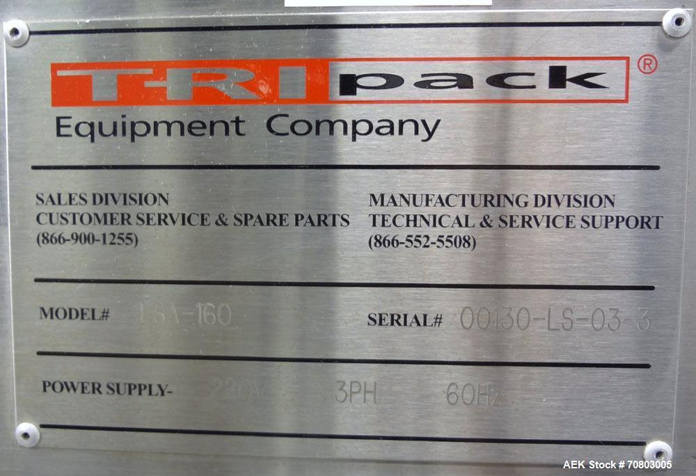 Used TriPack LSA-160 Automatic Shrink Sleeve Labeler Applicator / Neck Bander. Capable of speeds up to 100 BPM. Layflat width 40mm-170mm. Product Diameter 1" to 4.25". Cut off length 30mm-200mm. Thic...