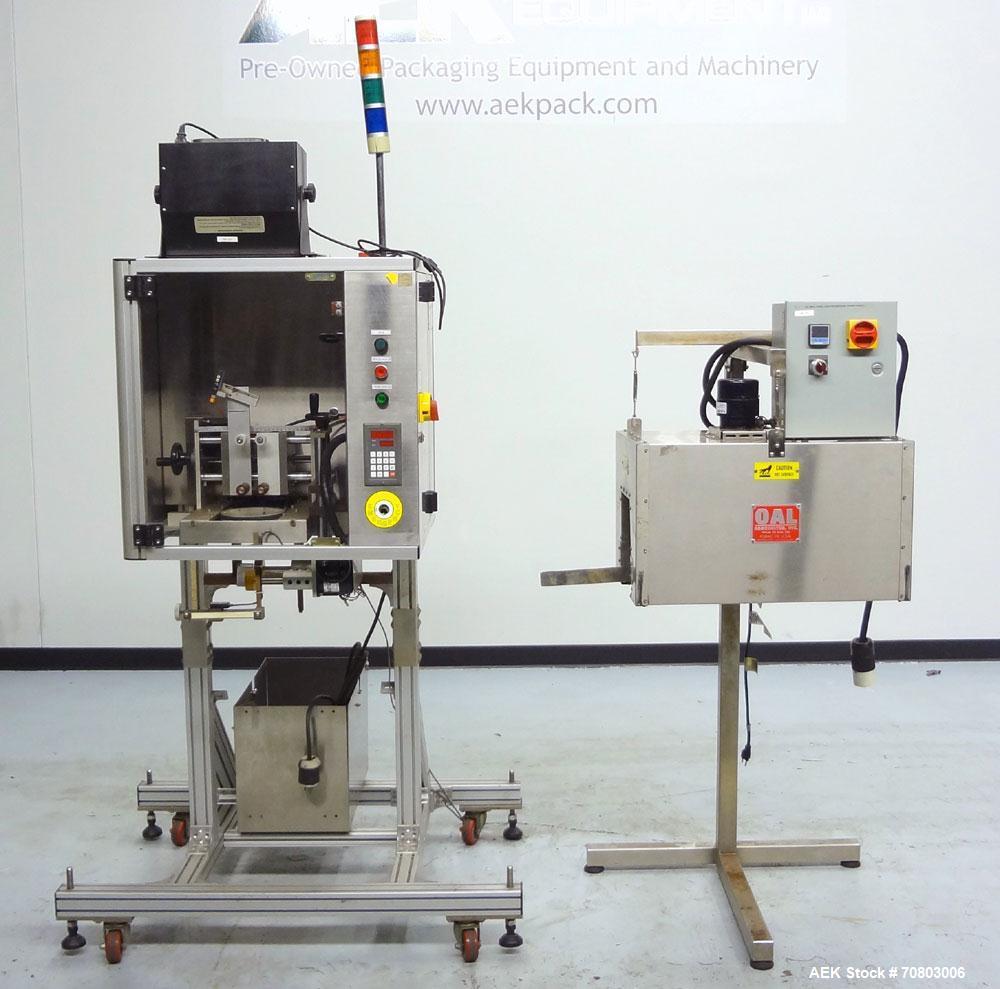 Used TriPack LSA-160 Automatic Shrink Sleeve Labeler Applicator / Neck Bander. Capable of speeds up to 100 BPM. Layflat width 40mm-170mm. Product diameter 25mm to 1" to 110mm. Cut off length 30mm-200...