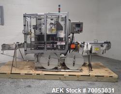 Used-Used PDC neck bander sleever, model 75E, speeds up to 300 containers/minute, .375 - 3.5" diameter, .625 - 9" high band ...