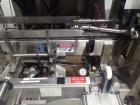 Used-Used PDC neck bander sleever, model 75E, speeds up to 300 containers/minute, .375 - 3.5