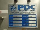 Gebrauchter PDC-Nackenbander-Sleever, Modell 75E, beschleunigt bis zu 300 Behälter / Minute, .375 - 3.5' Durchmesser, .625 -...