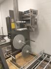 Used Axon 300SL High Speed Shrink Sleeve Labeling Line