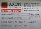 Used Axon Corporation EZ-100 Tamper Evident Band and Sleeve Label Applicator capable of speeds up to 150 packages per minute. Stainless steel design. Has vertical perforation, power unwind station an...