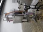 Used Axon Corporation EZ-100 Tamper Evident Band and Sleeve Label Applicator