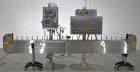 Used Axon Styrotech EZ-Seal EZ-200 Single Head Tamper Evident Neck Bander. Designed to run up to 120 containers per minute. 1-60/115 volt, 10 amp, serial # T-100210B, built 05/2010. Includes a heat s...