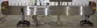 Used Axon Styrotech EZ-Seal EZ-200 Single Head Tamper Evident Neck Bander. Designed to run up to 120 containers per minute. 1-60/115 volt, 10 amp, serial # T-100210B, built 05/2010. Includes a heat s...