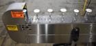 Used Axon Styrotech EZ-Seal EZ-200 Single Head Tamper Evident Neck Bander. Designed to run up to 120 containers per minute. 1-60/115 volt, 10 amp, serial # T-100210B, built 05/2010. Includes a heat s...