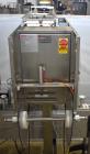 Used Axon Styrotech EZ-Seal EZ-200 Single Head Tamper Evident Neck Bander. Designed to run up to 120 containers per minute. 1-60/115 volt, 10 amp, serial # T-100210B, built 05/2010. Includes a heat s...