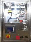 Used Axon Styrotech EZ-Seal EZ-200 Single Head Tamper Evident Neck Bander. Designed to run up to 120 containers per minute. 1-60/115 volt, 10 amp, serial # T-100210B, built 05/2010. Includes a heat s...
