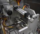 Used Axon Styrotech EZ-Seal EZ-200 Single Head Tamper Evident Neck Bander. Designed to run up to 120 containers per minute. 1-60/115 volt, 10 amp, serial # T-100210B, built 05/2010. Includes a heat s...