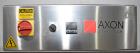 Used Axon Styrotech EZ-Seal EZ-200 Single Head Tamper Evident Neck Bander. Designed to run up to 120 containers per minute. 1-60/115 volt, 10 amp, serial # T-100210B, built 05/2010. Includes a heat s...