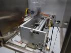 Used Axon EZ-300 Sleeve Labeler/Tamper Evident Band Applicator