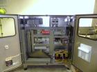 Used Fuji Intersleeve Model 3200H Horizontal sleeve labeler. Maximum speed 15,000/hour ( ref. sleeve 100 cl x 30lfw). Product diameter 8-40mm, product length 40-200mm. Last running plastic vials off ...