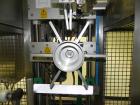 Used- Graham Packaging RF200LRSleeve Labeler. Capable of speeds up to 200 bottles per minute. Sleeve layflat range of 30mm -...