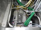 Used- Graham Packaging RF200LRSleeve Labeler. Capable of speeds up to 200 bottles per minute. Sleeve layflat range of 30mm -...