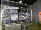 Used- Graham Packaging RF200LRSleeve Labeler. Capable of speeds up to 200 bottles per minute. Sleeve layflat range of 30mm -...