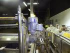 Used- Graham Packaging RF200LRSleeve Labeler. Capable of speeds up to 200 bottles per minute. Sleeve layflat range of 30mm -...