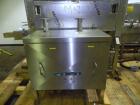 Used- Graham Packaging RF200LRSleeve Labeler. Capable of speeds up to 200 bottles per minute. Sleeve layflat range of 30mm -...