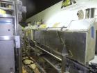 Used Graham Packaging RF200LRSleeve Labeler. Capable of speeds up to 200 bottles per minute. Sleeve layflat range of 30mm - 200mm,cut length up to 200mm. Has dual wormscrew infeed, HMI interface and ...