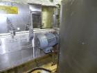 Used Graham Packaging RF200LRSleeve Labeler. Capable of speeds up to 200 bottles per minute. Sleeve layflat range of 30mm - 200mm,cut length up to 200mm. Has dual wormscrew infeed, HMI interface and ...