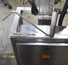 Used Marburg Industries Model M-725-FB Auto Cap Sealer. Approximate speeds up to 200 units per minute. Approximate bands up to a 70mm closure. Has Mitsubishi MELSEC PLC, Mitsubishi drive. Serial# 165...