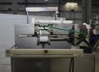Used Marburg Industries Model M-725-FB Auto Cap Sealer. Approximate speeds up to 200 units per minute. Approximate bands up to a 70mm closure. Has Mitsubishi MELSEC PLC, Mitsubishi drive. Serial# 165...