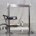 Used Marburg Industries Model M-725-FB Auto Cap Sealer. Approximate speeds up to 200 units per minute. Approximate bands up to a 70mm closure. Has Mitsubishi MELSEC PLC, Mitsubishi drive. Serial# 165...