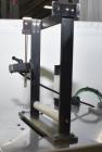 Used Marburg Industries Model M-725-FB Auto Cap Sealer. Approximate speeds up to 200 units per minute. Approximate bands up to a 70mm closure. Has Mitsubishi MELSEC PLC, Mitsubishi drive. Serial# 165...