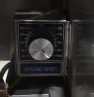Used Marburg Industries Model M-725-FB Auto Cap Sealer. Approximate speeds up to 200 units per minute. Approximate bands up to a 70mm closure. Has Mitsubishi MELSEC PLC, Mitsubishi drive. Serial# 165...