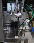 Used Marburg Industries Model M-725-FB Auto Cap Sealer. Approximate speeds up to 200 units per minute. Approximate bands up to a 70mm closure. Has Mitsubishi MELSEC PLC, Mitsubishi drive. Serial# 165...
