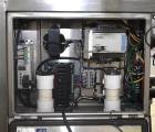 Used Marburg Industries Model M-725-FB Auto Cap Sealer. Approximate speeds up to 200 units per minute. Approximate bands up to a 70mm closure. Has Mitsubishi MELSEC PLC, Mitsubishi drive. Serial# 165...