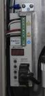 Used Marburg Industries Model M-725-FB Auto Cap Sealer. Approximate speeds up to 200 units per minute. Approximate bands up to a 70mm closure. Has Mitsubishi MELSEC PLC, Mitsubishi drive. Serial# 165...