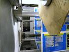 Used SleeveCo Automatic Sleeve Label Machine, Model SL-3000. Capable of speeds up to 50 containers per minute. Maximum size 2-1/2 gallon containers and currently set up on a one gallon round sleeve l...