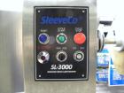 Used SleeveCo Automatic Sleeve Label Machine, Model SL-3000. Capable of speeds up to 50 containers per minute. Maximum size 2-1/2 gallon containers and currently set up on a one gallon round sleeve l...
