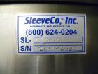 Used SleeveCo Automatic Sleeve Label Machine, Model SL-3000. Capable of speeds up to 50 containers per minute. Maximum size 2-1/2 gallon containers and currently set up on a one gallon round sleeve l...