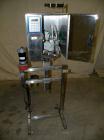 Used Accutek Accusleever Tamper Evident Neck Bander Or Shrink Sleeve Labeler. Capable of speeds up to 60 cpm. Film sizes: Lay flat 16 mm to 150 mm and cut length 16 mm to75 mm. Inclueds a shrink tunn...